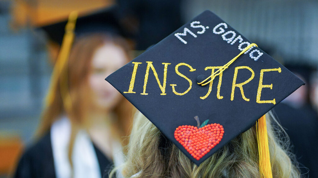 graduation cap with decorations on it