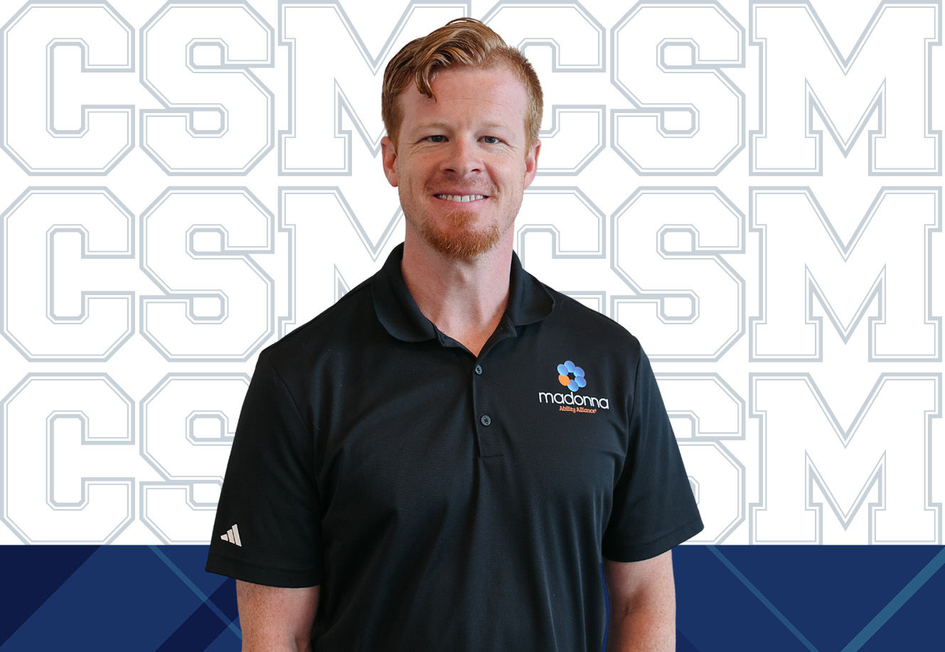 Chris Miller, a 2016 alum from the Master of Arts in Teaching program, stands facing the camera smiling amidst a branded CSM background.